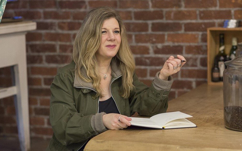 Dar Williams with notebook